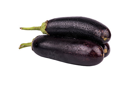 三个茄子紫色蔬菜小吃宏观白色黑色水果食物绿色图片