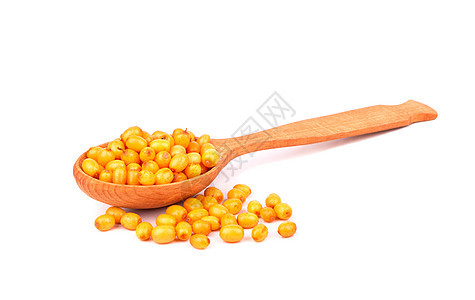 勺子里的巴克松浆果植物橙子黄色水果沙棘宏观草本植物白色浆果季节图片