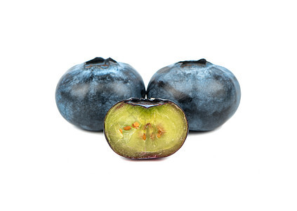 新鲜蓝莓和一半营养蓝色白色甜点水果团体浆果食物蔬菜覆盆子图片
