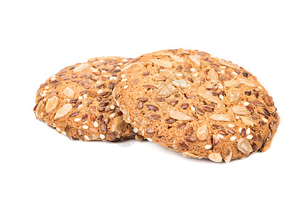 牛奶燕麦带有谷物的燕麦饼干营养面包美食芝麻种子糖果向日葵食物甜点早餐背景