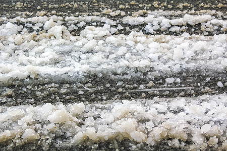 雪地布雷梅海文德国的汽车轮胎痕迹建筑景观背景仙境踪迹小路旅行天气降雪季节图片