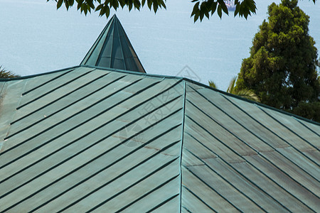 绿色屋顶背景 金属屋顶控制板瓦楞栅栏建筑蓝色建筑学宏观材料墙纸房子图片