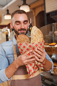 店铺的帅男面包师糕点职业食物咖啡店食堂创业企业家面包购物服务图片