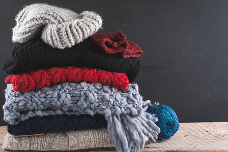 编织多彩和纹质的织织服装纺织品毛衣材料木头帽子配饰乡村天气产品围巾图片