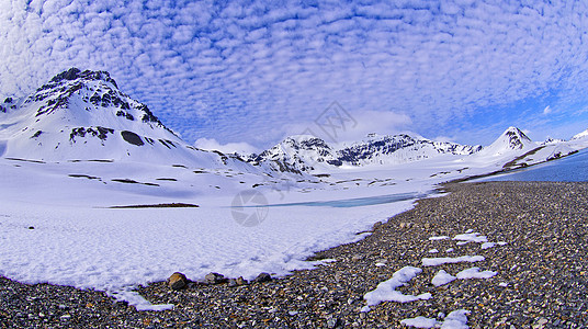 挪威特里格哈姆纳湾雪地山脉旅行勘探气候变化全球海岸线目的地自然公园保护气候风景图片