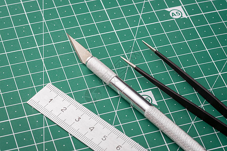 折纸制作概念绿色仪器刀具艺术工作小样刀刃镊子工艺空白图片