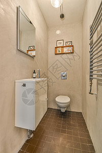厕所和下水道的厕所白色卫生间浴室制品家庭龙头毛巾陶瓷脸盆反射图片