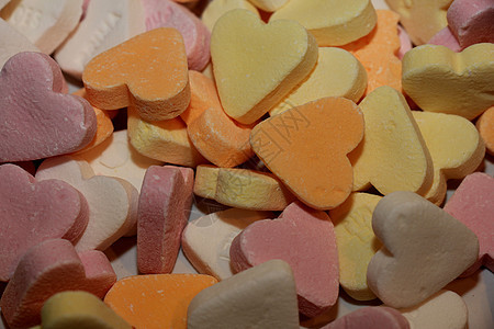 面糊彩色糖果红心心形橙子甜点食物小吃粉色白色黄色友谊混合物图片