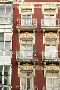 在卡塔赫纳的美丽现代主义者风格屋外露面遗产历史性栏杆装饰古董阳光窗户街道旅行历史图片