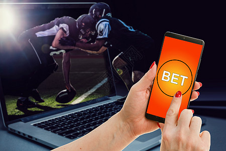 手机显示一个有现场结果的赌注应用程序 有白色背景的最新信息 在线赌注概念优胜者橄榄球技术运动玩家足球竞赛细胞广播金融图片