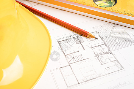 建筑房屋计划项目蓝图 配有黄色头盔和工程建筑工具 单位 千美元文书安全工程师职场房子草稿建造商业绘画工作图片