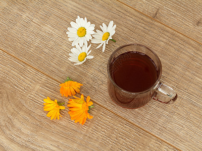 一杯茶 加白甘菊花食物杯子茉莉花玻璃草本植物白色早餐植物饮食草本图片