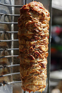 沙瓦玛肉被切开烤箱捐赠者羊肉旋转火鸡食物牛肉街道车削烤肉图片