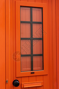 新的封闭式现代亮橙色门关上图片