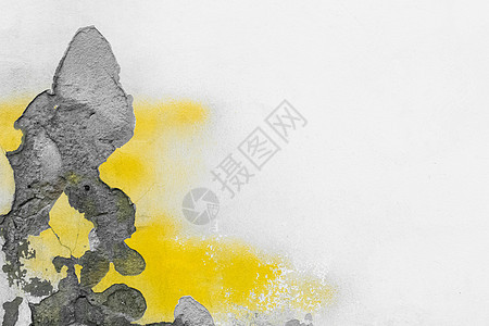 用黄色油漆抽象图案纹理背景从旧墙面表面切碎的白石灰泥刻板材料风化损害房子石头裂缝石膏水泥建筑墙纸图片