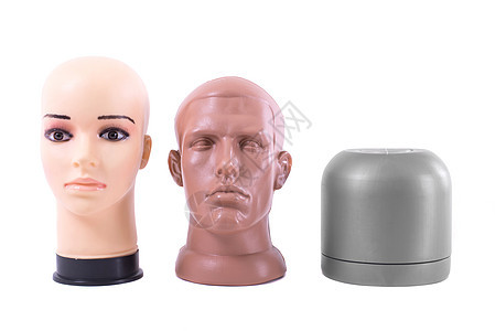 假头在白色背景上被孤立 关上门帽子黑色女孩男人玩具塑料眼睛脖子模型嘴唇图片