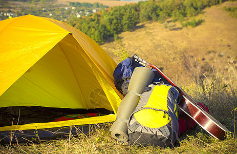 山上露营帐篷旅游绿色假期远足冒险公园橙子营地森林太阳图片