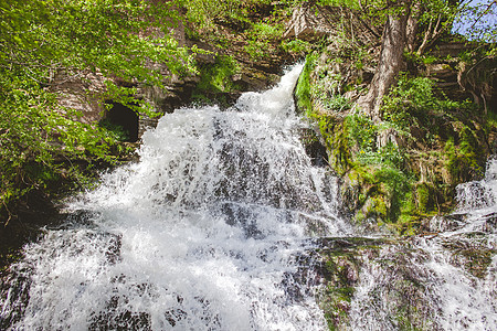 水瀑流动场景热带水晶水池旅游石头荒野瀑布风景图片