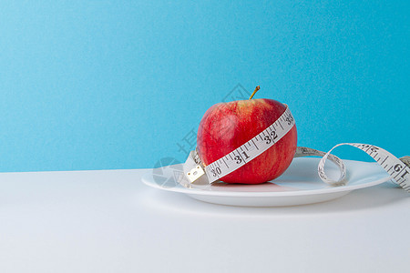以苹果作为减肥的手段 肥胖问题 水果饮食活力健身房红色食物营养维生素磁带重量绿色测量图片