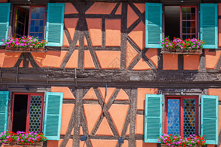 春春时建筑 带鲜花 法国东部旅游城市生活地方乡村房子摄影假期景观历史性文化背景图片