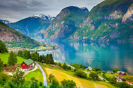 挪威农村和Sognefjord的分支农场目的地农业乡村假期晴天野花山脉天空旅游草地图片