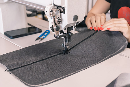 裁缝缝纫工作纺织品缝纫机衣服织物工厂技术工具服装业机器图片