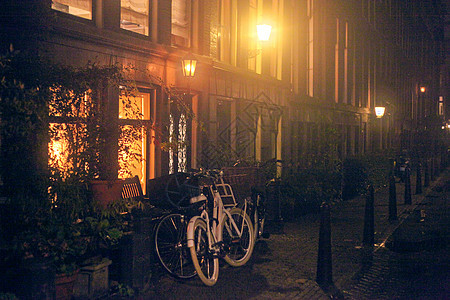 荷兰阿姆斯特丹市  欧洲旅游概念文化历史性遗产自行车房子街道建筑场景旅行建筑学图片