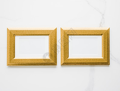 大理石上的金色相框 平面模型  装饰和模型平面概念摄影金子框架房间艺术平铺网店小样奢华印刷品图片