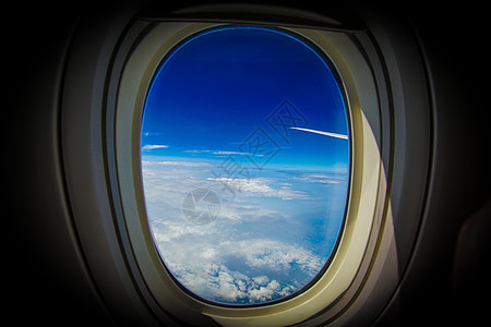 飞机拍摄从飞机的窗口看到云和天空 Name蓝天飞机场喷射玻璃沙滩蓝色海岸窗框照片透明度背景