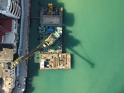 建造码头的浮起吊船疏疏浚驳船 空中最高风景甲板海岸线驳船海滩挖掘机建筑平台海岸漂浮工程图片