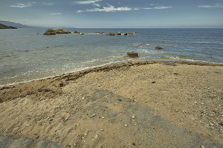 沙沙滩晴天衬套海岸旅游热带植被太阳海滩旅行岩石图片