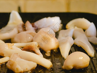 在家烧烤和烹饪一种亚得里亚海切面鱼食物食谱鱿鱼饮食美食海鲜溪流午饭鱼钩烧伤背景图片