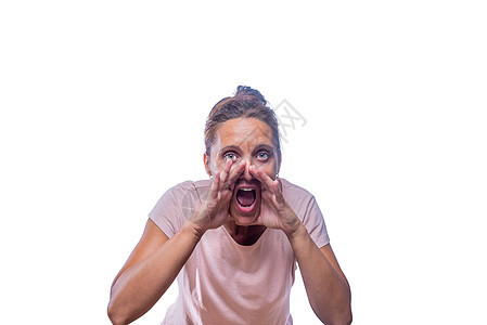 一个女人用手在嘴里尖叫着图片