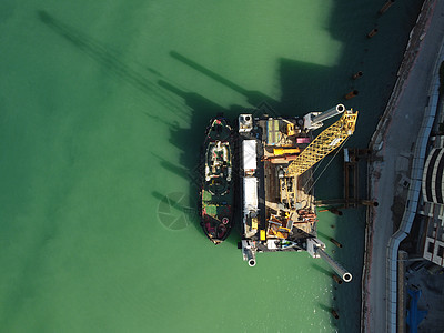 建造码头的浮起吊船疏疏浚驳船 空中最高风景工程建筑运输蓝色技术港口海岸驳船血管疏浚图片