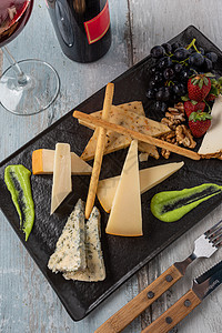 果美奶酪板石头木板蓝色美食盘子坚果乡村自助餐干酪奶制品图片
