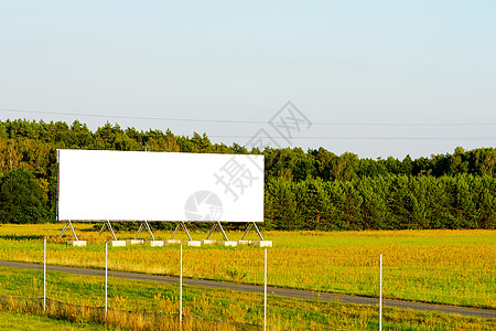 空白广告牌样机 设计模板 夕阳下的广告牌框架旅行天空嘲笑商业木板建筑汽车树木海报图片