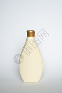 在白色背景上被孤立的Beige空白塑料瓶凝胶管子润肤洗剂奶油洗发水温泉洗澡泡沫治疗图片