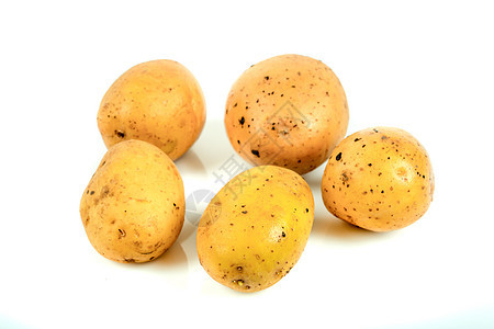 孤立白背景的全新鲜土豆糖类棕色收成生产饮食植物淀粉黄色宏观块茎图片