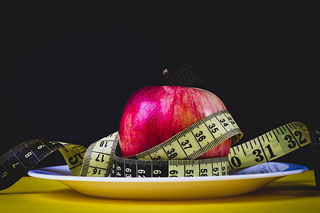以苹果作为减肥的手段 肥胖问题 水果饮食活力健身房损失绿色重量营养红色测量磁带食物图片