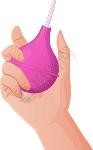 手握着粉红色橡胶灌肠或胶囊 医疗清洁身体脱毒工具乐器便秘直肠吸气器外科诊所手术注射器药品橡皮图片