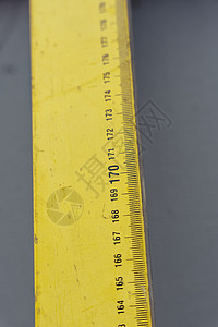 黄黄泡泡楼层 在灰色背景上标有长度标记仪表乐器小路液体测量房子工作木匠水平金属图片