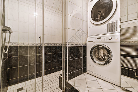在现代浴室装洗衣机的淋浴箱卫生公寓卫生间风格住宅装饰品龙头建筑学装饰管道图片