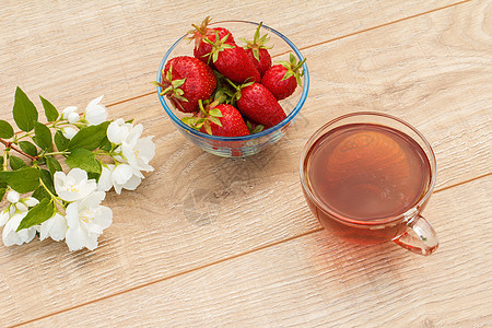 一杯绿色茶 加白茉莉花草本植物药品玻璃植物早餐食物杯子饮食图片