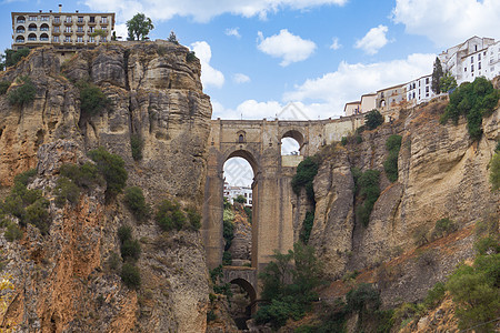 从西班牙安达卢西亚新隆达桥河水中历史全景桥梁风景植被岩石场景峡谷地方建筑学图片