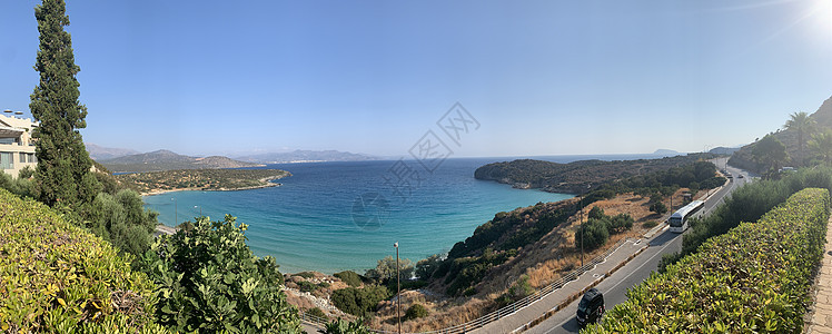 希腊克里特市米拉贝罗湾的景象 地中海海中的松石水域和悬崖热带地标岩石墙纸阳光蓝色海洋全景液体海浪图片