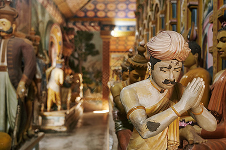 斯里兰卡佛教徒祈祷的古老雕塑作品胸部艺术信仰文化雕像宗教古董寺庙崇拜建筑学图片