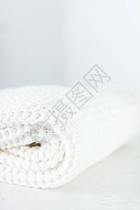 柔软和白色的暖湿编织衣服折叠毛衣纺织品服装衣柜羊毛零售手工壁橱羊绒图片