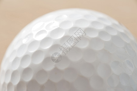 白色高尔夫球的贴近细节背景图片