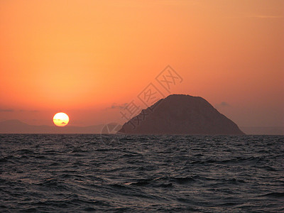 海上日落辉光海景海洋太阳橙子背景图片