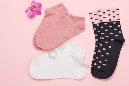 粉红色背景的女人袜子 最佳视野服装灵活性兰花针织品女性团体纺织品短袜衣服棉布图片